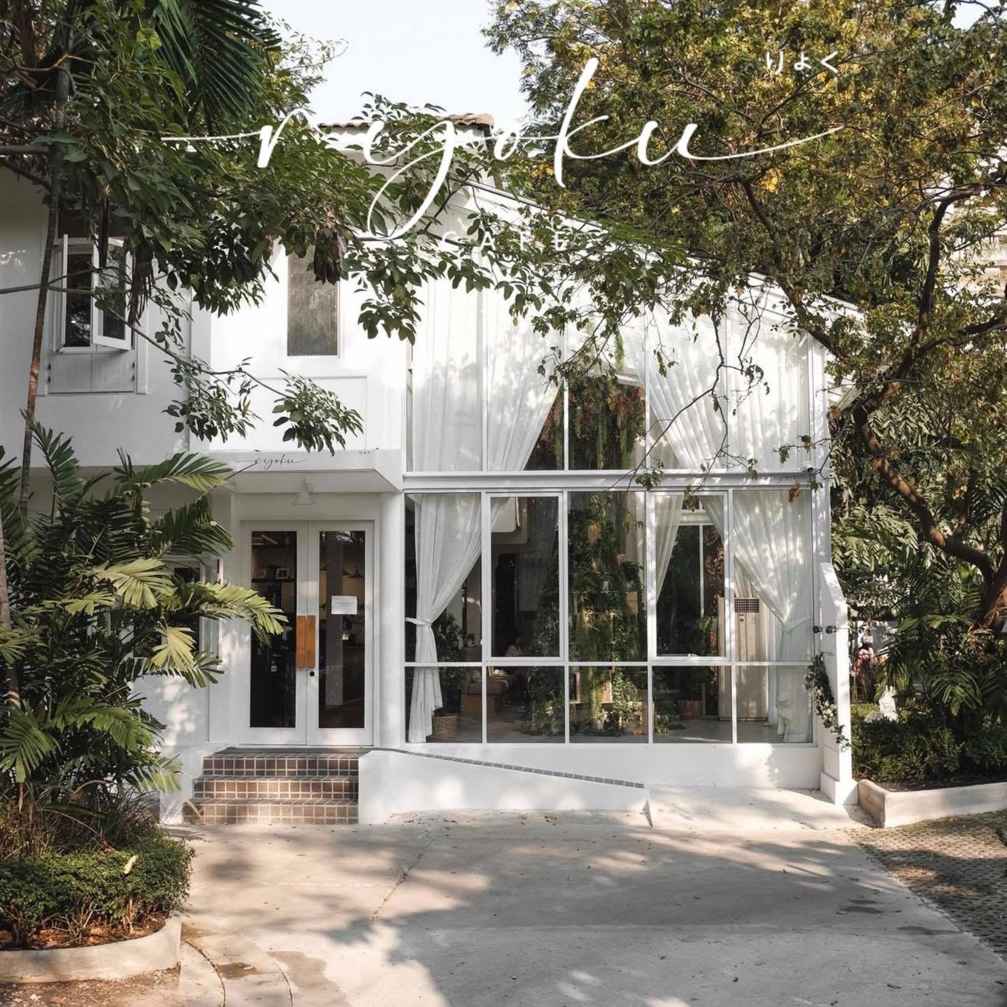 Ryoku Cafe exterior with logo over the white facade